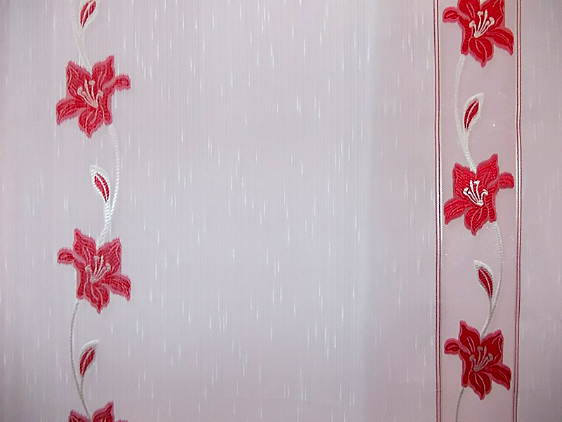 White curtain with red flowers